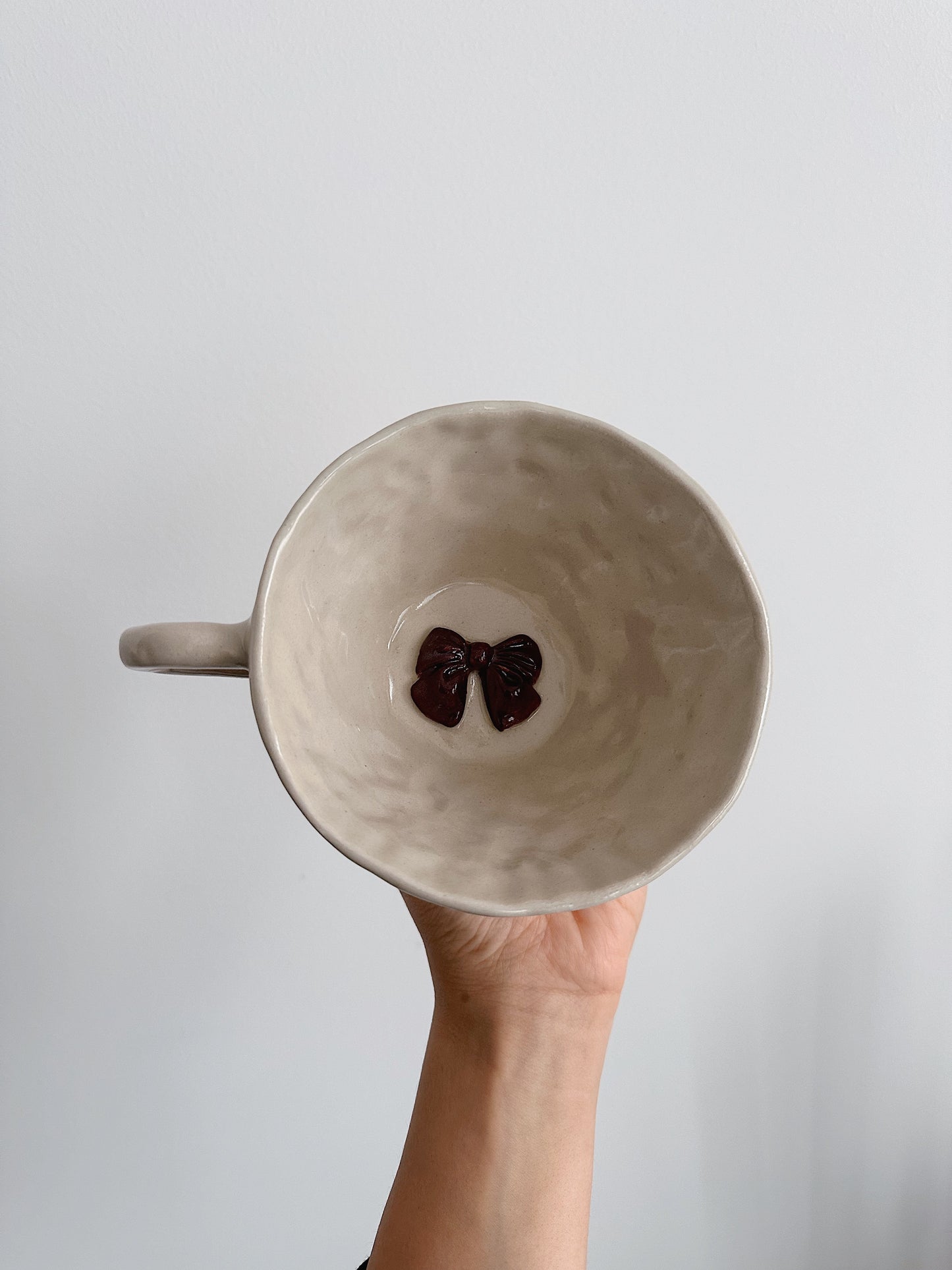 Tea time bow mug (glaze defect)