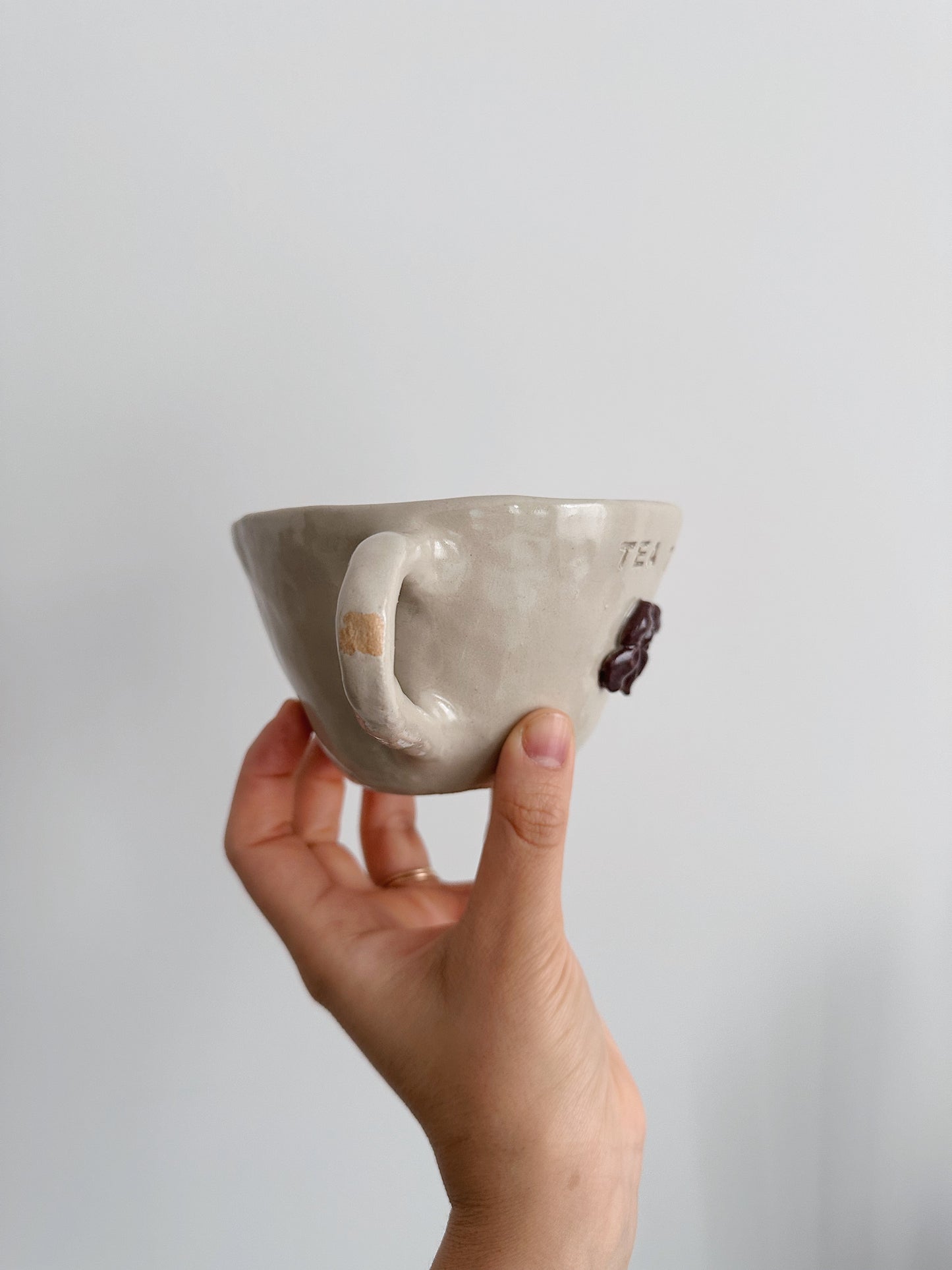 Tea time bow mug (glaze defect)