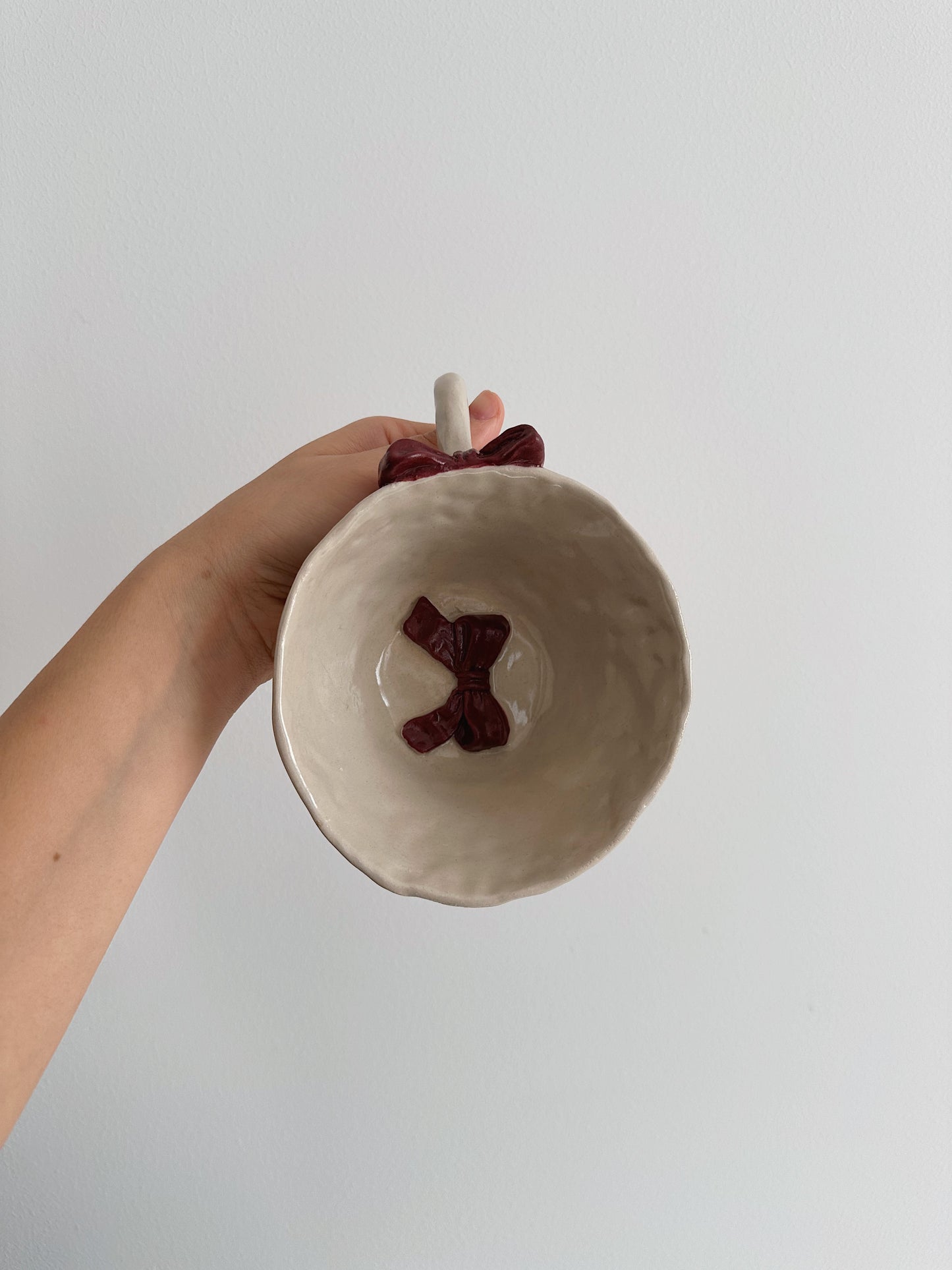 Dark red bow mug