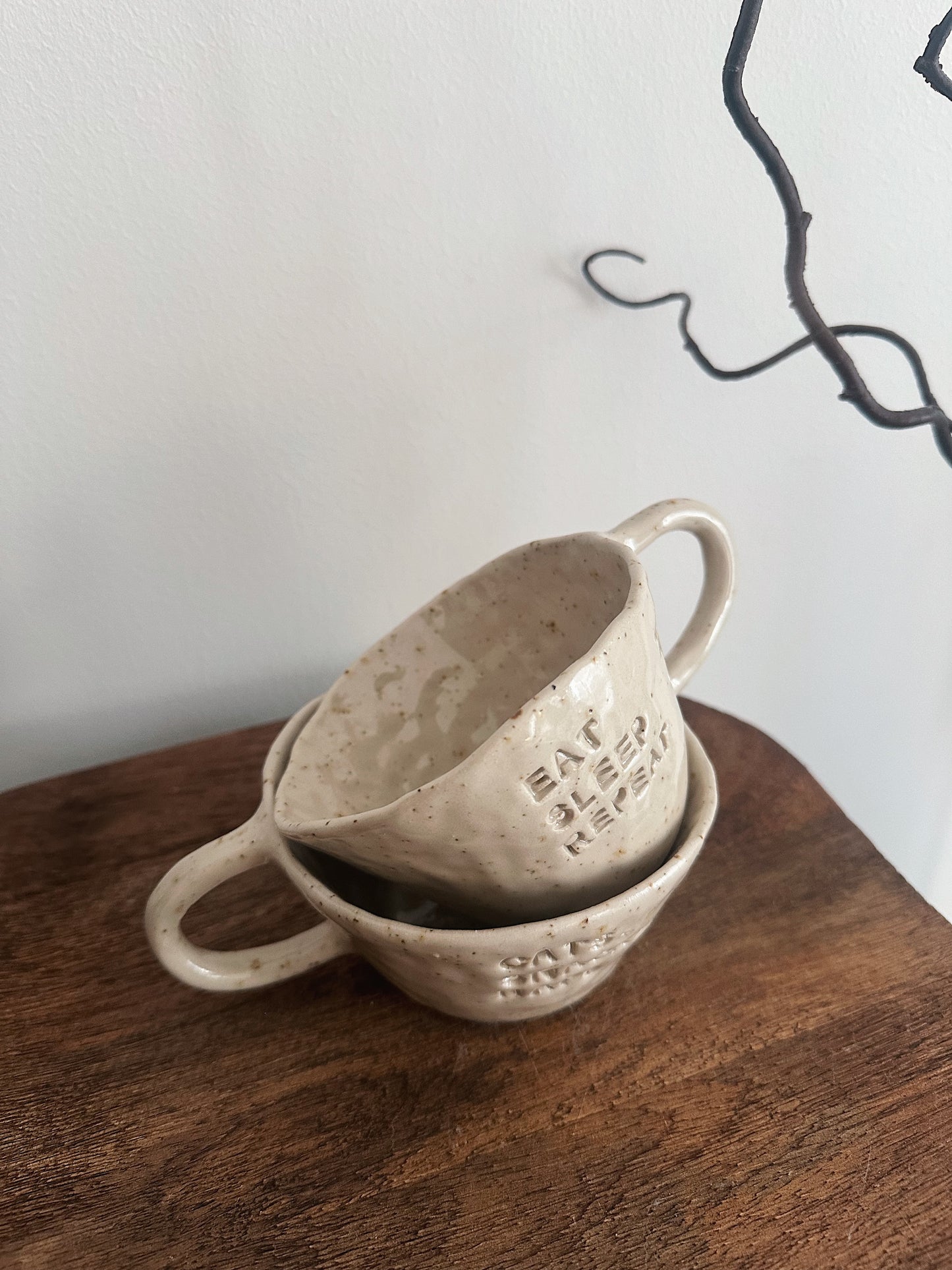 Eat sleep repeat mug