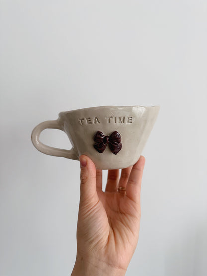 Tea time bow mug (glaze defect)