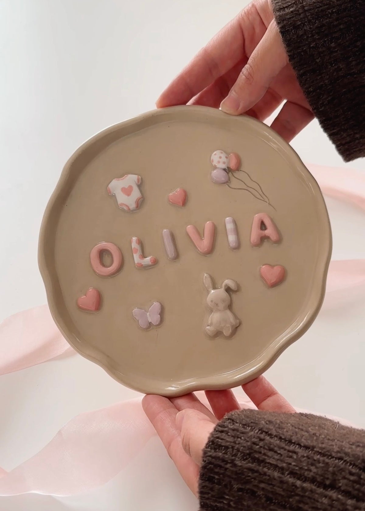 OLIVIA nameplate