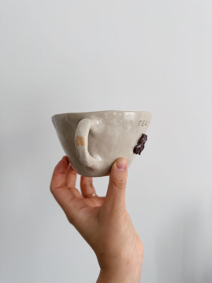 Tea time bow mug (glaze defect)