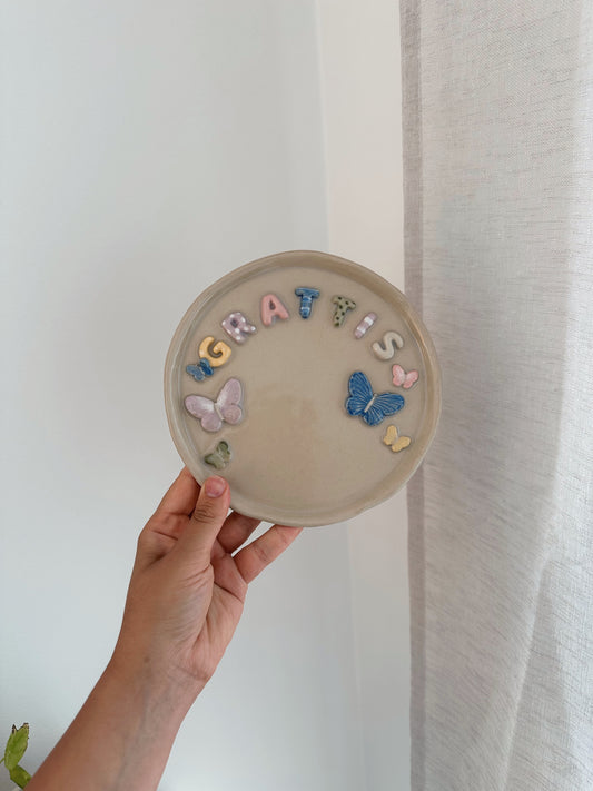 GRATTIS plate with butterflies