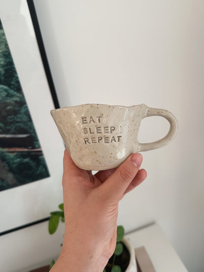 Eat sleep repeat mug